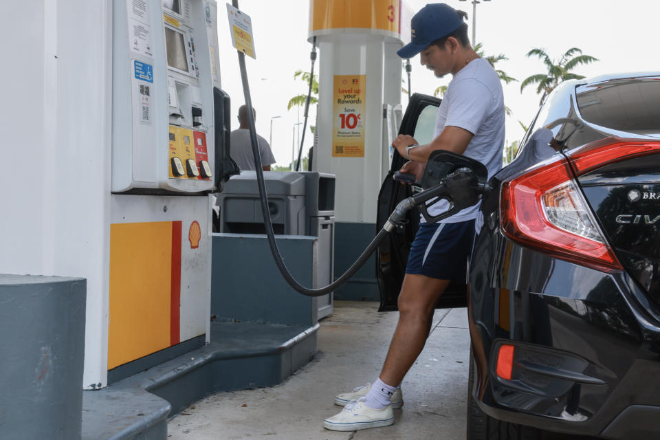 MIAMI, FLORIDA - MAY 15: A customer fills up at a Shell station on May 15, 2024 in Miami, Florida.  Florida drivers saw prices drop 16 cents a gallon last week, just before drivers hit the roads for Memorial Day. The national average on Monday was $3.62 a gallon, putting pressure on prices at consumer as general inflation declined.  (Photo by Joe Raedle/Getty Images)