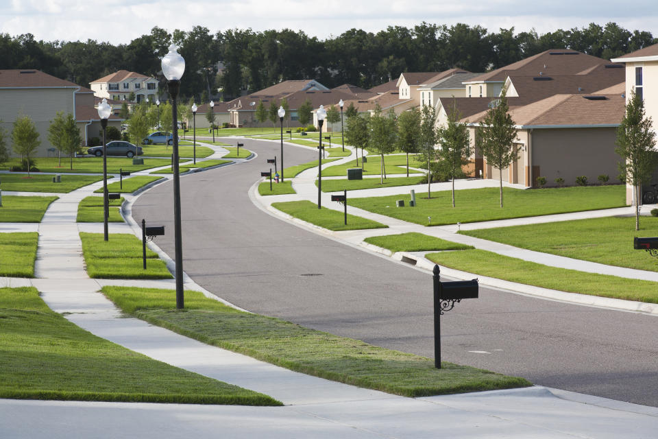 Experts are revising their forecasts on mortgage rates and home prices for the rest of the year.