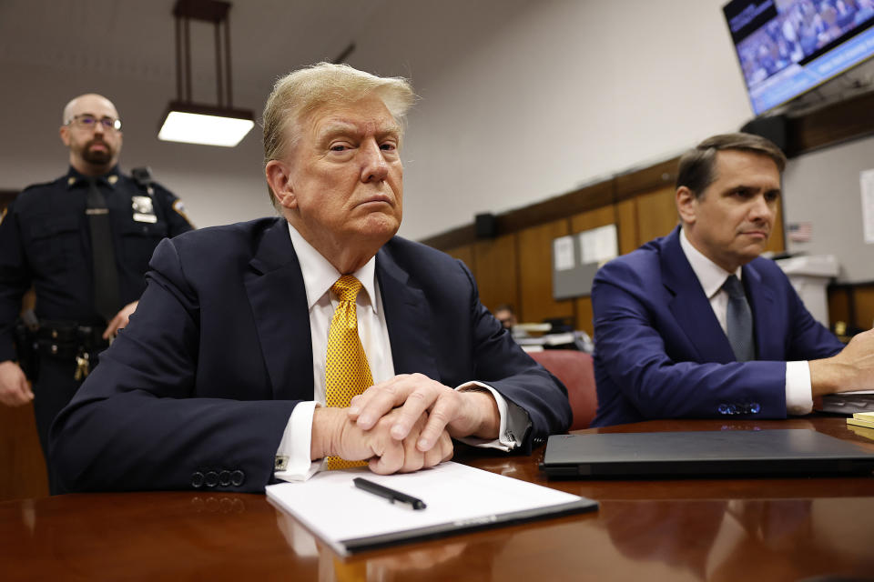 FILE - Former President Donald Trump is in court for his trial in Manhattan Criminal Court, Tuesday, May 21, 2024, in New York.  As Trump attacked the US criminal justice system following his guilty verdict, analysts say his allegations could be useful to Russian President Vladimir Putin and other autocrats.  (Michael M. Santiago/Pool photo via AP, file)