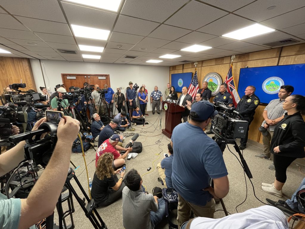 Reporters and camera crews packed a conference room in a state building in Waikluku to hear updates on the fires in Lahaina and elsewhere on Maui.