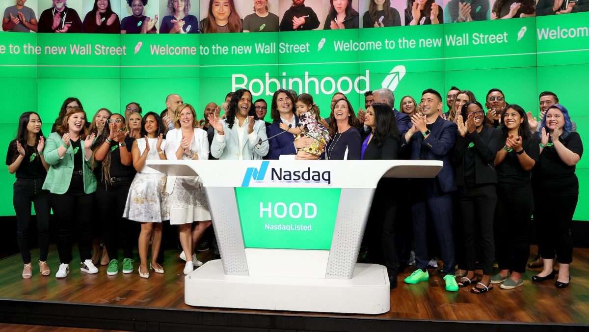 Robinhood's Baiju Bhatt and Vlad Tenev celebrate after ringing the bell on Robinhood Markets IPO Listing Day on July 29, 2021 in New York City.