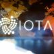 IOTA-logo-with-translucent-world-map-background.