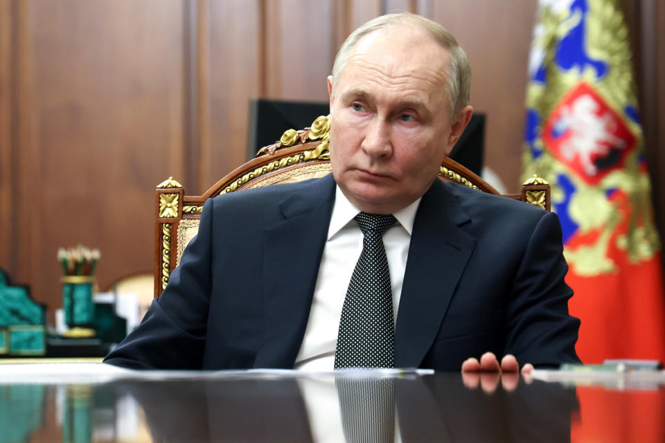 Russian President Vladimir Putin attends a meeting with Orenburg Region Governor Denis Pasler at the Kremlin in Moscow, Russia, Wednesday, May 29, 2024. (Alexander Kazakov, Sputnik, Kremlin Pool Photo via AP)