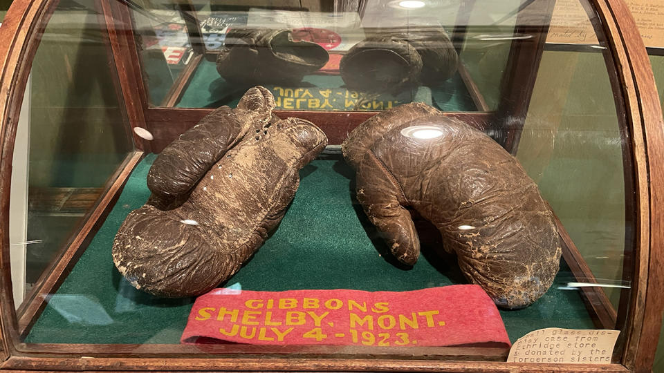 The gloves worn by Tommy Gibbons in his July 4, 1923 fight against Jack Dempsey on display at the Marias Art and History Museum in Shelby, Montana. (Ben Fowlkes/Yahoo Sports)