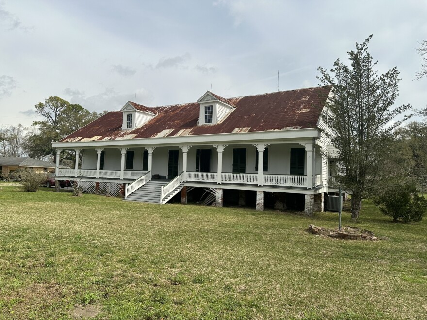 Woodland Plantation House sits near the banks of the Mississippi River in LaPlace, Louisiana. The tall Creole-style building with a rusted tin roof and wide front porch is home to black owners for the first time. The site is historically significant because it is where one of the largest slave revolts in U.S. history began.