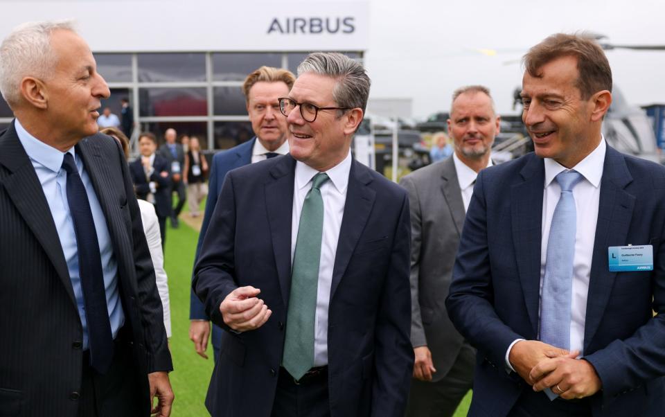 Tufan Erginbilgic, left, with Sir Keir Starmer and Airbus boss Guillaume Faury at this month's Farnborough International Airshow